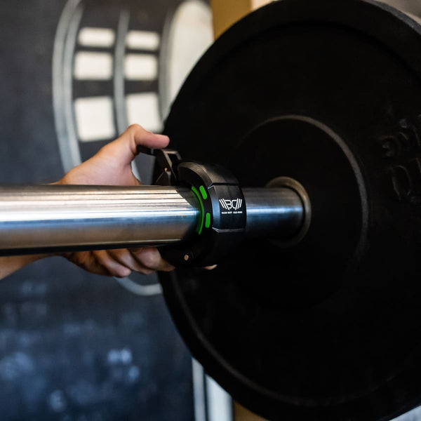 Black Magnetic Barbell Collars/Barbell Clips with magnet in use - Warm Body Cold Mind