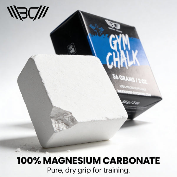 A block of gym chalk is placed in front of a black and blue box. Text reads "100% Magnesium Carbonate, Pure, dry grip for training." - Warm Body Cold Mind