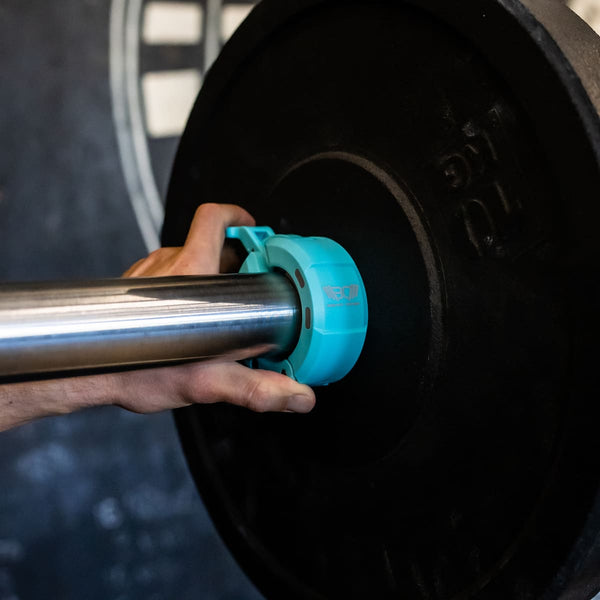 Blue Magnetic Barbell Collars/Barbell Clips with magnet in use - Warm Body Cold Mind