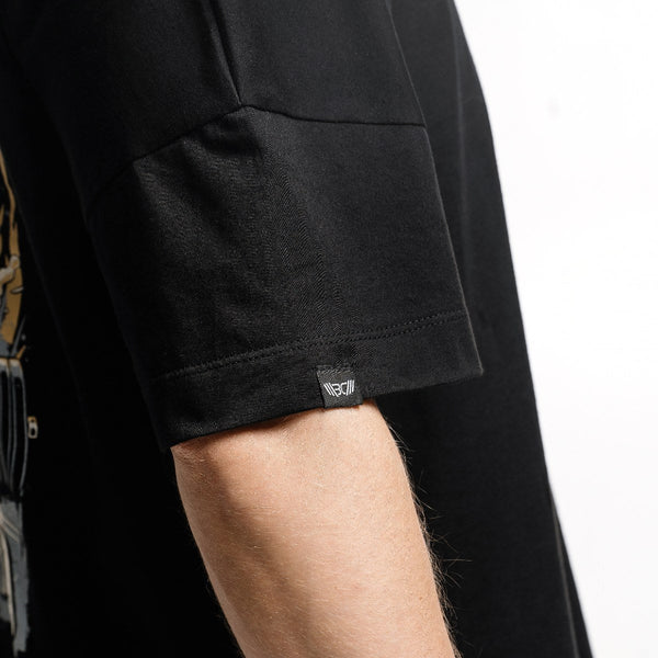 Cotton black T-Shirt Lift Off on lifter (WBCM logo on the sleeve close-up view) - Warm Body Cold Mind