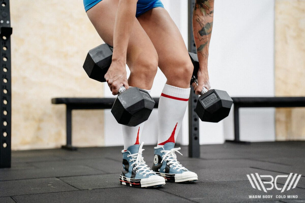 Dumbbell workout in deadlifting socks