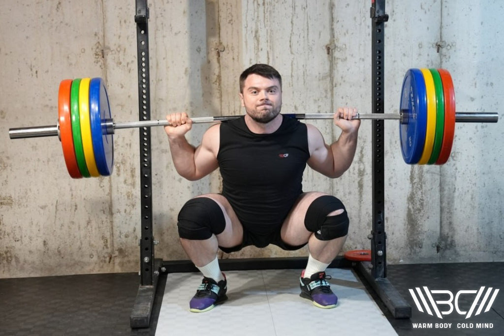 Oleksiy Torokhtiy Squatting With Knee Wraps