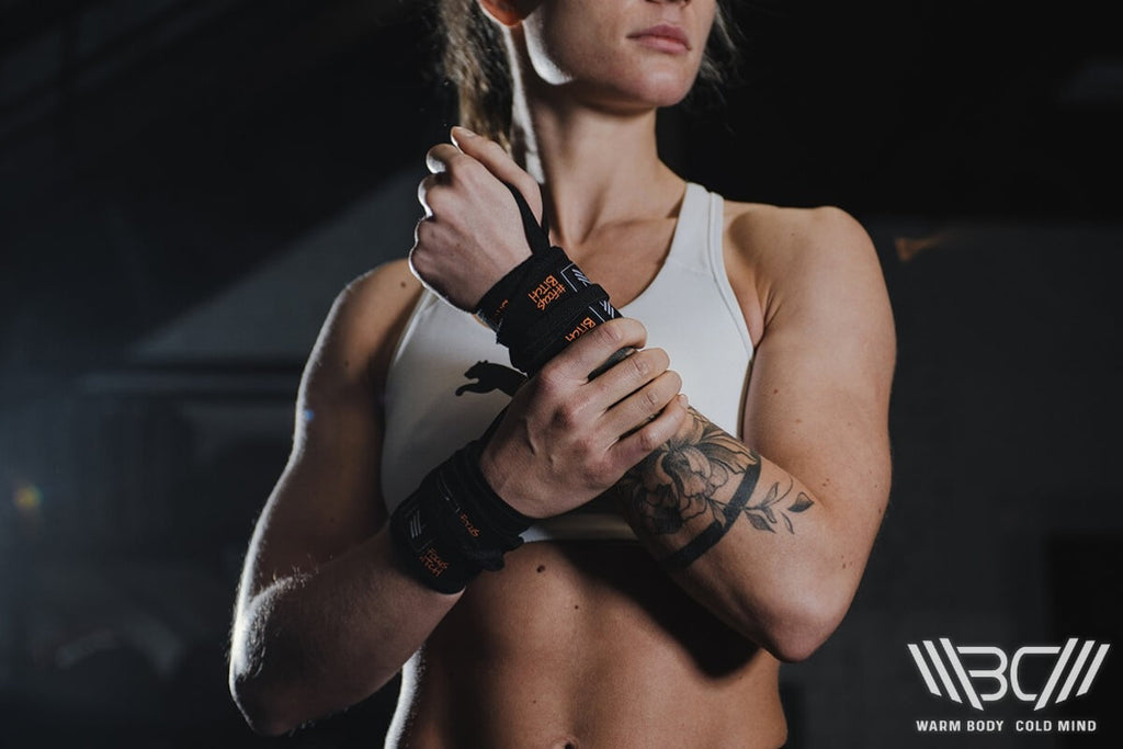 Woman Using Calisthenics Wrist Wraps WBCM